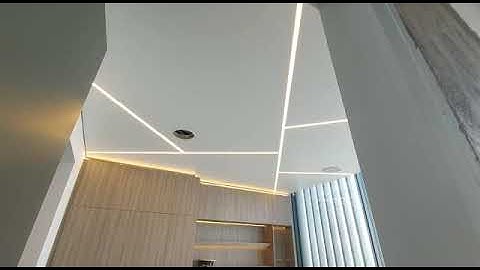 White satin stretch ceiling with linear light line