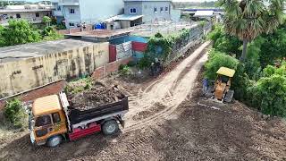 EP02,New project, narrow road, pouring soil to fill the inner plot using bulldozer and 5 ton truck