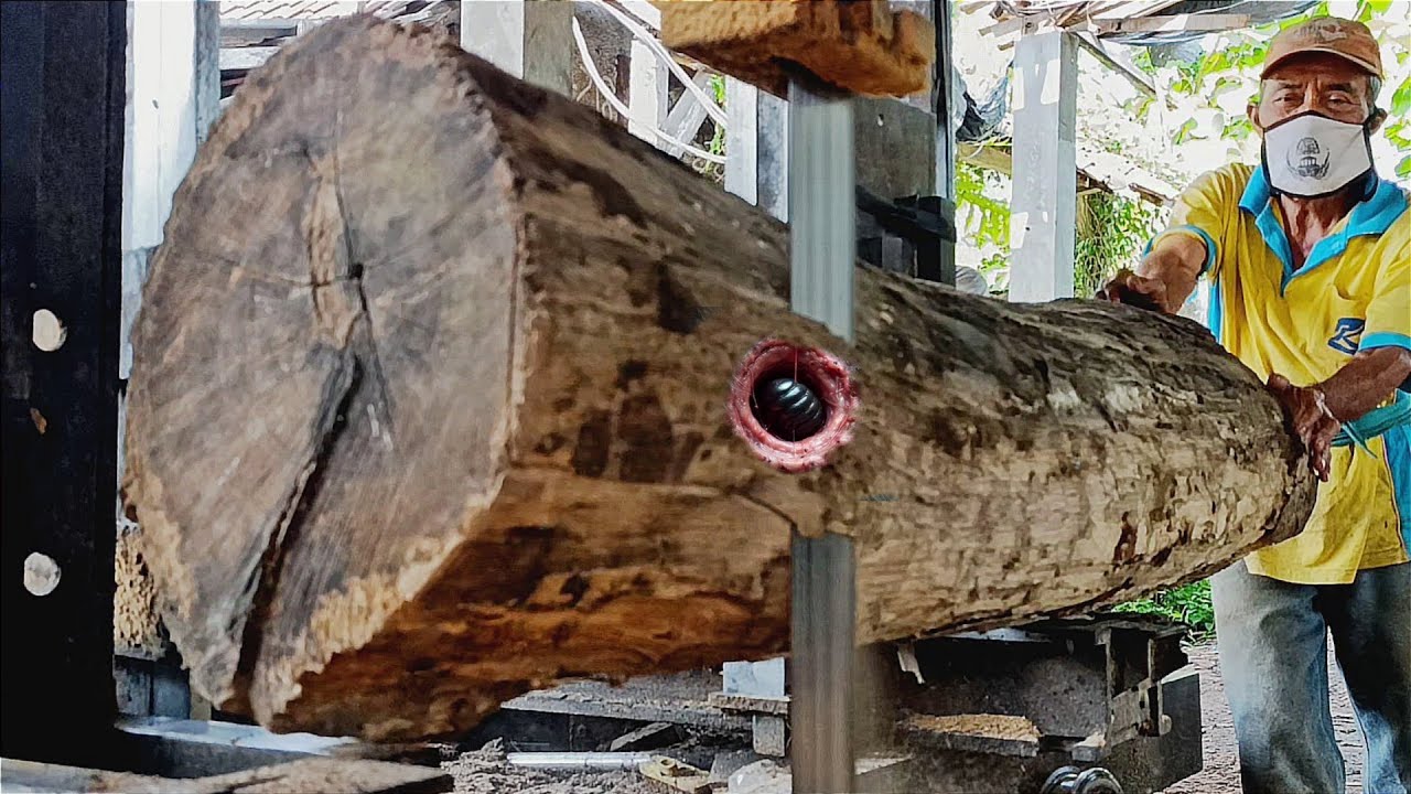 The process of sawing old & dried teak wood into planks. - YouTube