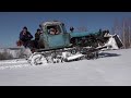Трактор ДТ 75 в очень глубоком снегу