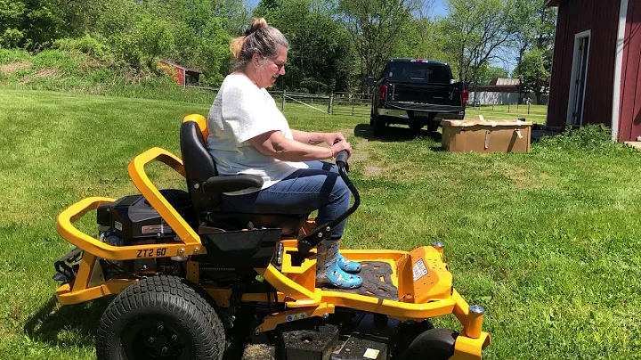 Theresa's first time on the Zero turn Tractor