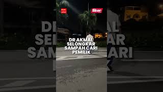 Dr Akmal selongkar sampah cari pemilik