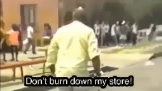 Man Crying Against The Riots Because The Rioters Burned His Store
