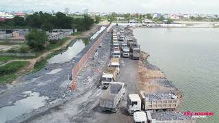 Creating an Access Road in a Lake using Wheel Loader to Move Stone and Many Truck to Unloading Stone