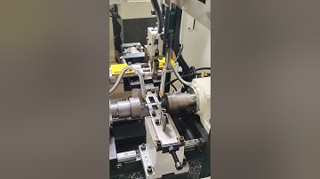 Fully automatic double-head plane chamfering machine, robot loading and unloading