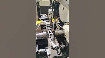 Fully automatic double-head plane chamfering machine, robot loading and unloading