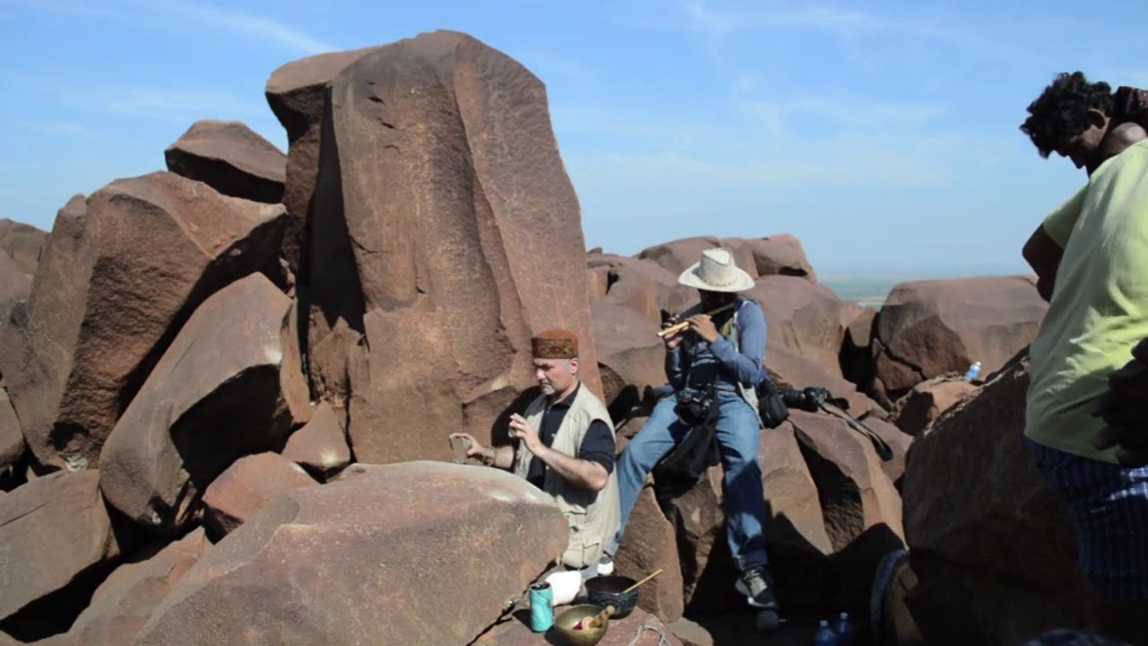 Lithophone 1 Sanj Hall plays the gong rocks