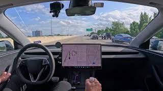 Tesla FSD 14.2.2.5 avoids an accident with a human driver in a Kia on the freeway
