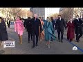 President Joe Biden walks toward the White House