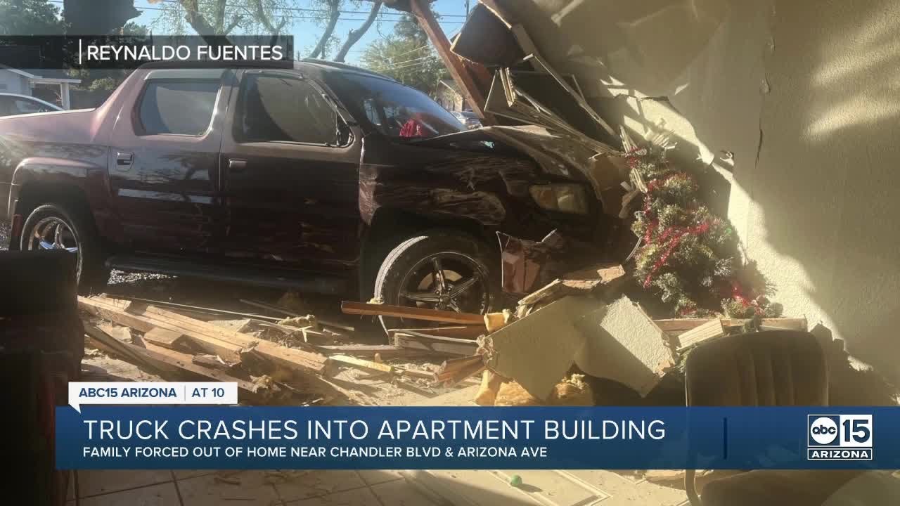 Family displaced after vehicle crashes into apartment building - YouTube