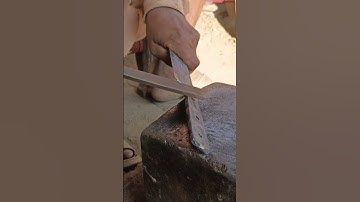 Traditional method of sharpening a knife with a file #shorts #blacksmith #forgedfromiron