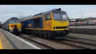 1Z16 Llandudno to Watford with 57303 with 60087 light engine next to it 