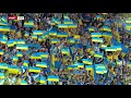 The ukrainian players and fans sing their national anthem at hampden park 