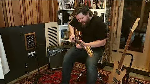 Hugh Neal at Friary Studio demonstrating his guitars