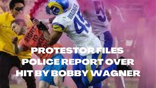PROTESTOR FILES POLICE REPORT OVER HIT BY BOBBY WAGNER