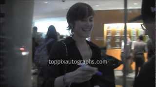 Carey Lowell - Signing Autographs at "The Untold Story Of 007" in NYC
