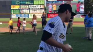 Celebrity Ethan Borican, Rachel Miller, Eric Borican, and Brian Miller throw out the first pitch before the T Wealth