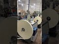 The paper cup machines are running in the client's factory