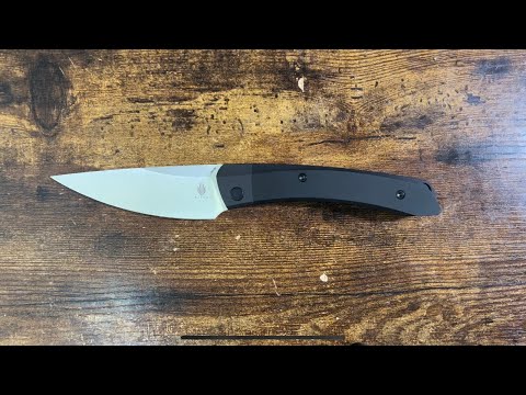 The Kizer Momo! A big knife that kinda doesn’t act like it