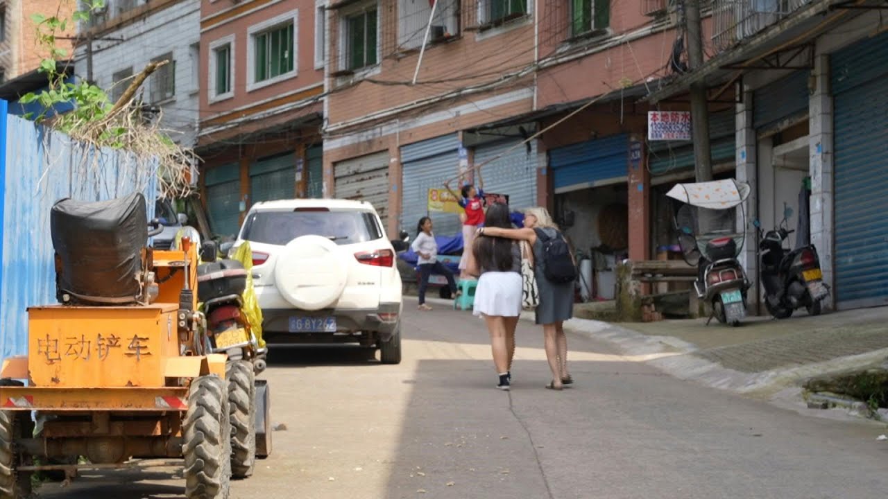 China's adopted children return from overseas to seek their roots | AFP