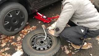 How to Change a Tire (plus jacking it up)--Changing snow tires\/wheels on my Jetta