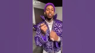 NLE Choppa throwing gang signs