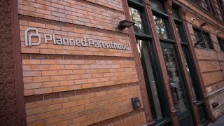 Trump signs anti-Planned Parenthood law