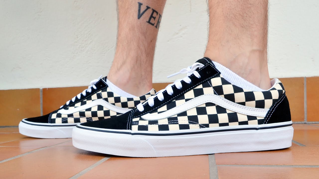 checkerboard vans old skool on feet