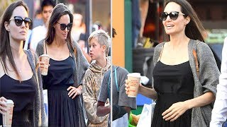 Angelina Jolie wears chic camisole dress while Shiloh shows off a skater buzz cut