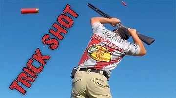 A New World Record - 7 Clays Shot with the Gun Upside Down Over the Head | Gould Brothers
