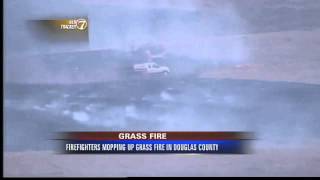 Firefighters Mop Up After Small Grass Fire
