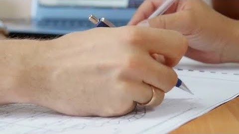 Sketching Over Blueprints Stock Video