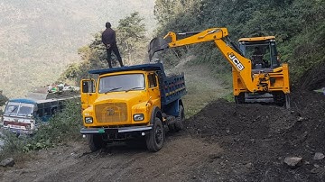 JCB Backhoe Cutting Soil and Loading in Dump Truck - Dump Truck Carrying Soil - JCB 3DX Video