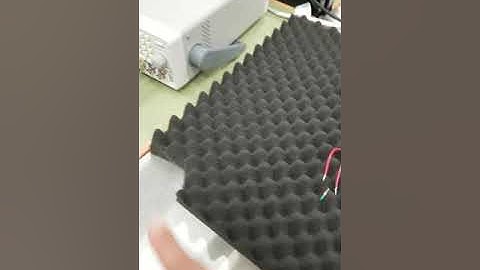 Observing vibrational response on a piezoelectric material using a laser doppler vibrometer.