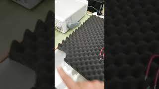Observing vibrational response on a piezoelectric material using a laser doppler vibrometer.