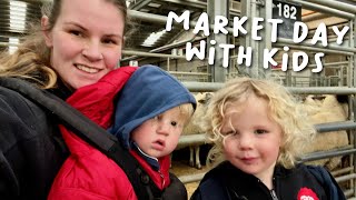 Selling lambs at the market with the kids!