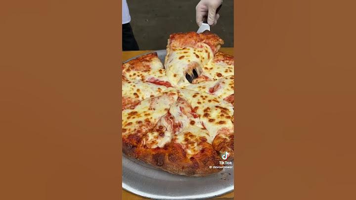 The DOUBLE STACKED PIZZA from in NYC is one of the most aggressive things we’ve ever DEVOURED.