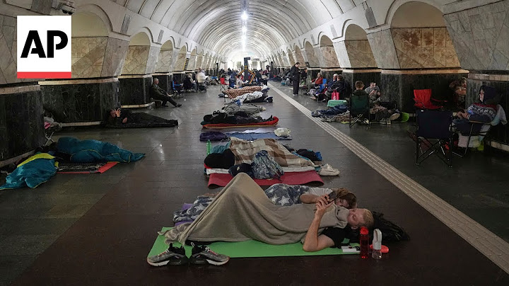 Kyiv residents sleep in metro station during a Russia attack in Ukraine
