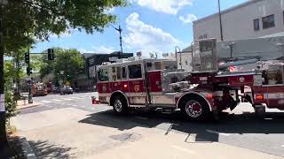 D.C fire engine 11 and truck 6 responding and hauling to a working row house fire