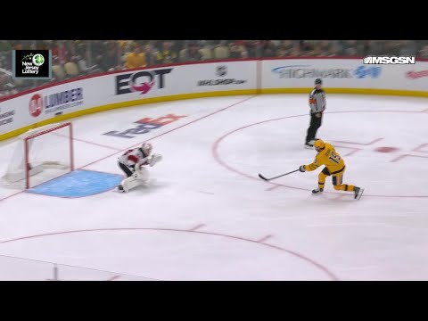 Connor Dewar scores a goal against the New Jersey Devils