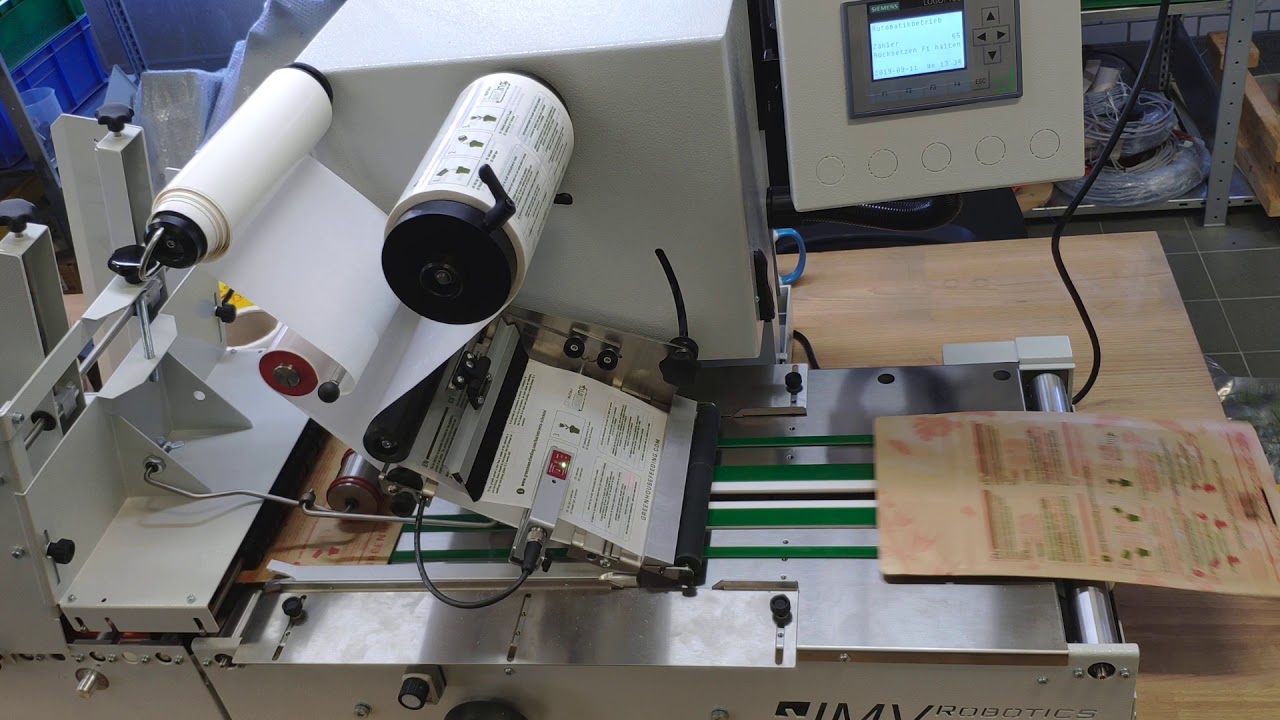 Automatic labeller for coated paper bags – LAB510