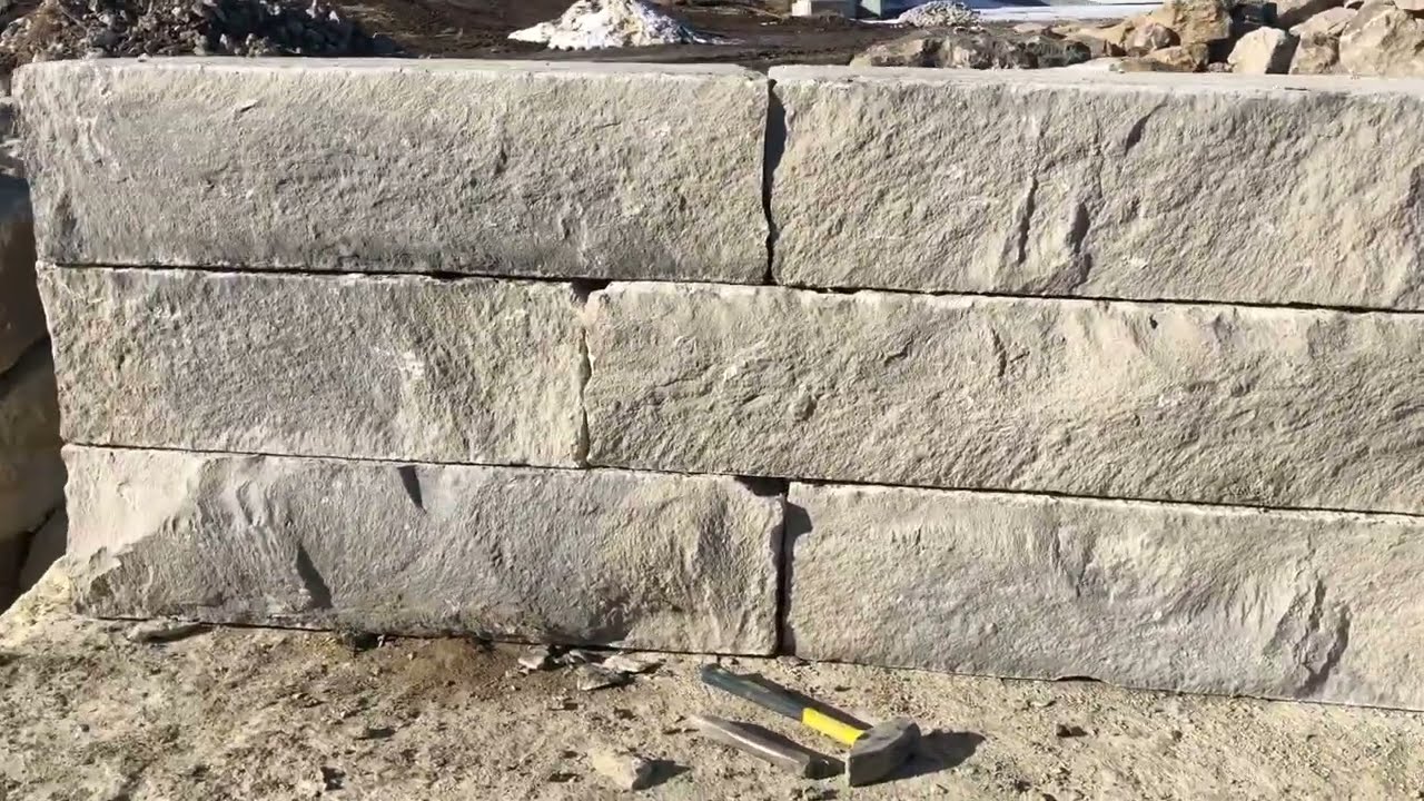Regular ledge stone vs Grindstone retaining wall block