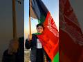 Shaiq Kafshani Holding The Afghan Flag In Islamabad Pakistan
