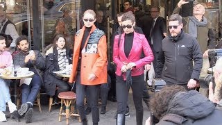 EXCLUSIVE : Bella Hadid and Gigi Hadid come out of Cafe de Flore in Paris