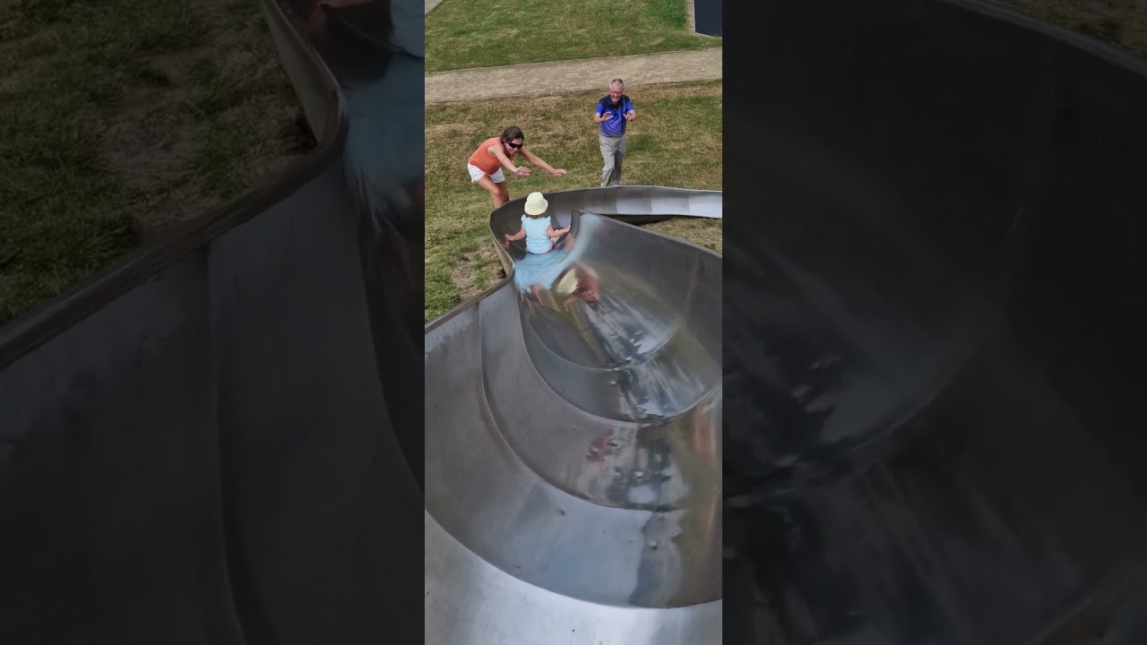 Big slide with daddy, auntie, gran and grampa all cheering me. look my hat came off. 18th June 2023