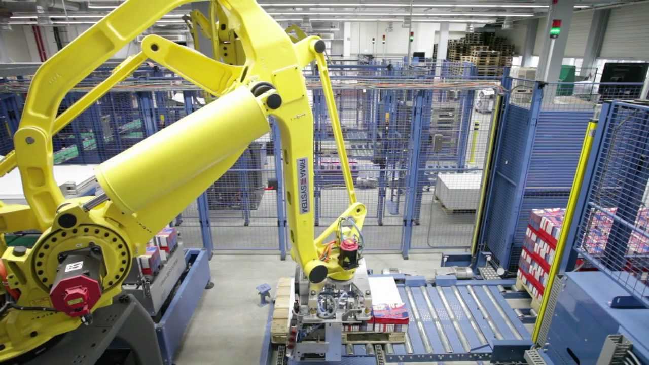 RIMA-SYSTEM High volume printing, stacking & palletizing behind 96p Lithoman IV 070