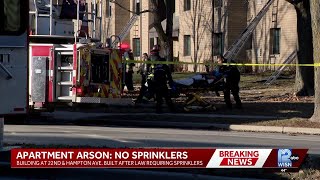 Firefighters Rush To Rescue People From Burning Apartment Building