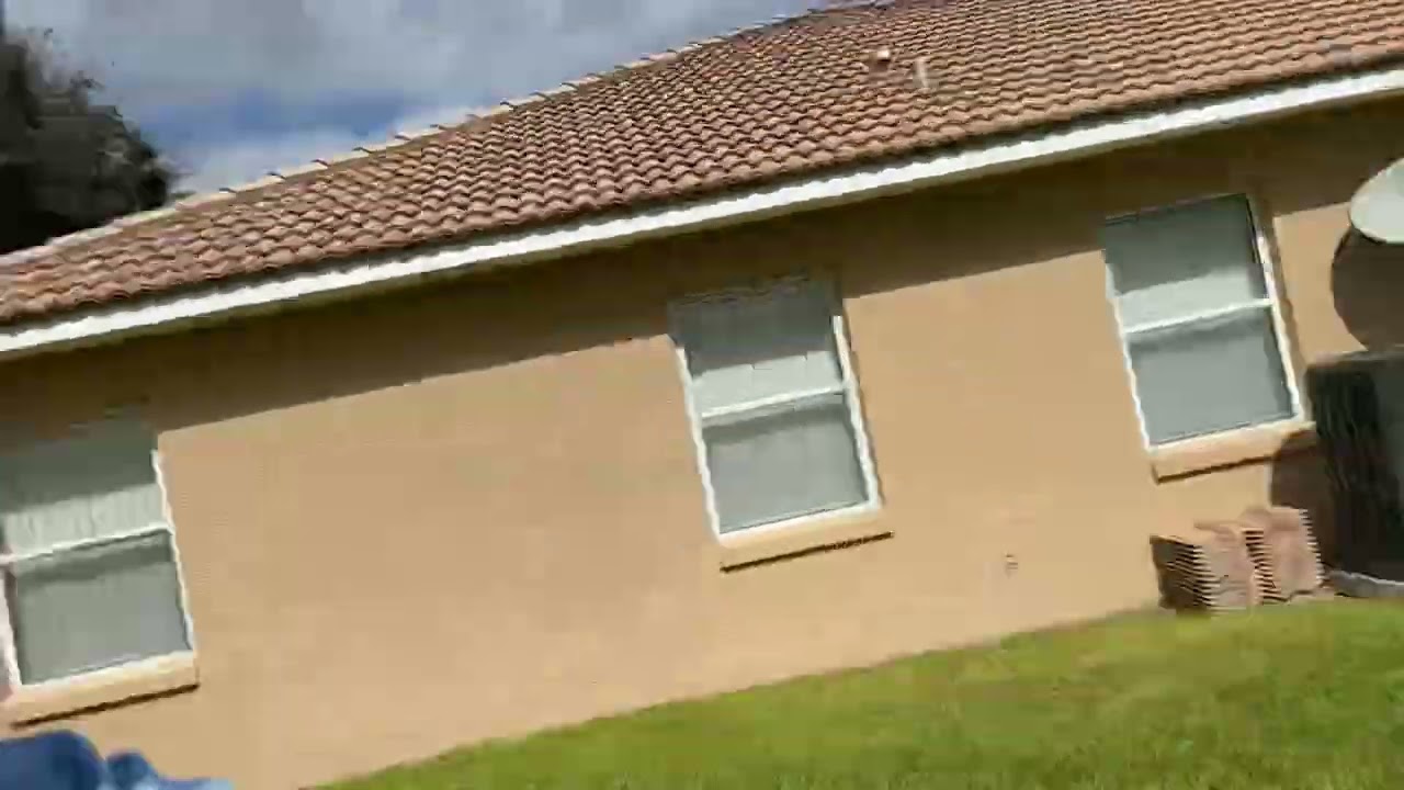 Tile roof soft wash with a 12v 4gpm pump. Shooting off an A-frame ladder for best vantage point.