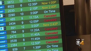 Snowstorm Prompts Nearly 500 Flight Cancellations Tuesday At Denver International Airport