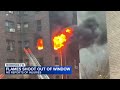 Flames shoot out of East Harlem apartment window